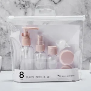 Travel size toiletry containers in an eight-piece refillable bottle and jar set