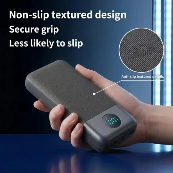 20000mAh Portable Power Bank — black power bank held in a hand