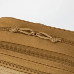 Close-up of tan organizer pouch zipper tracks and cord pull tabs