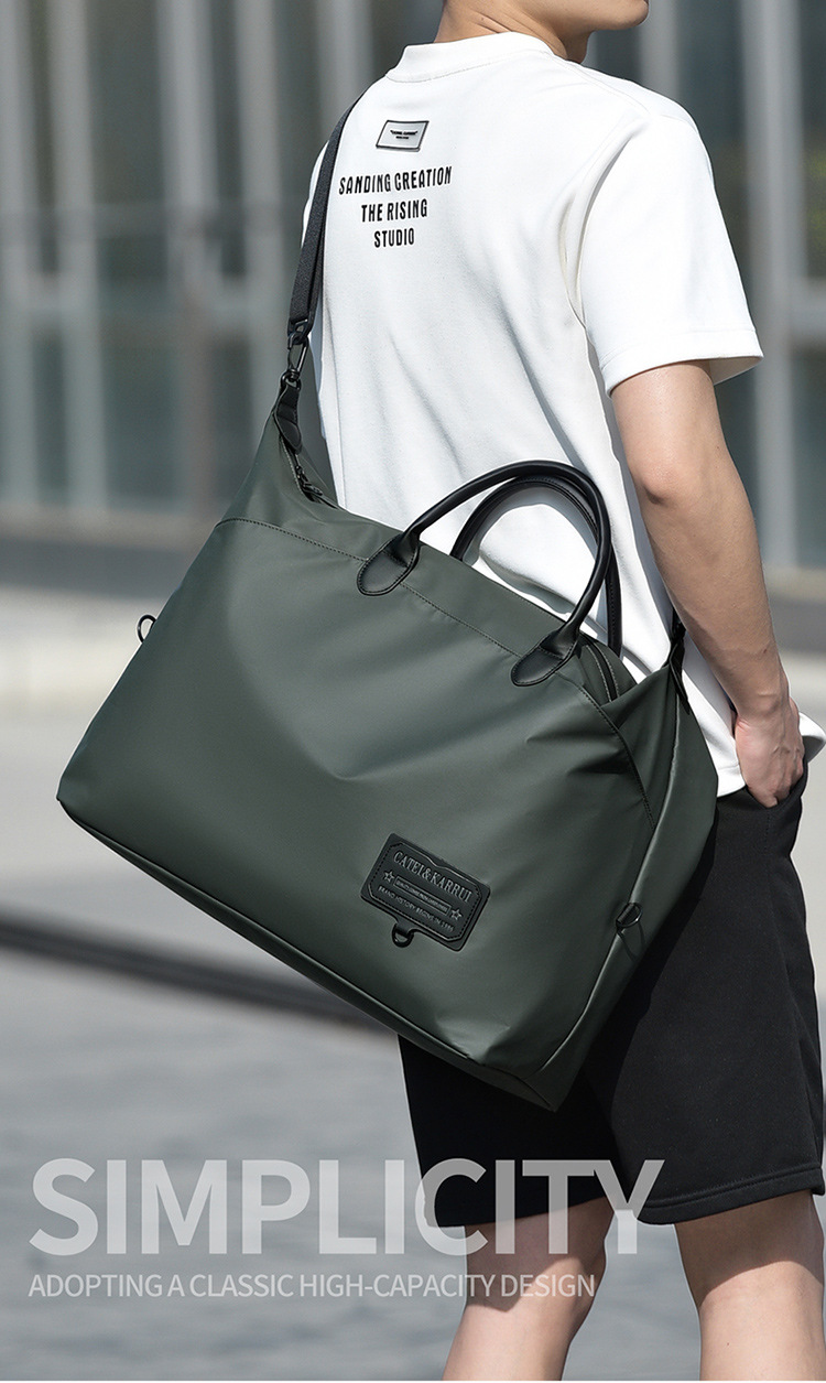 Traveler carrying a green tote bag by its top handles